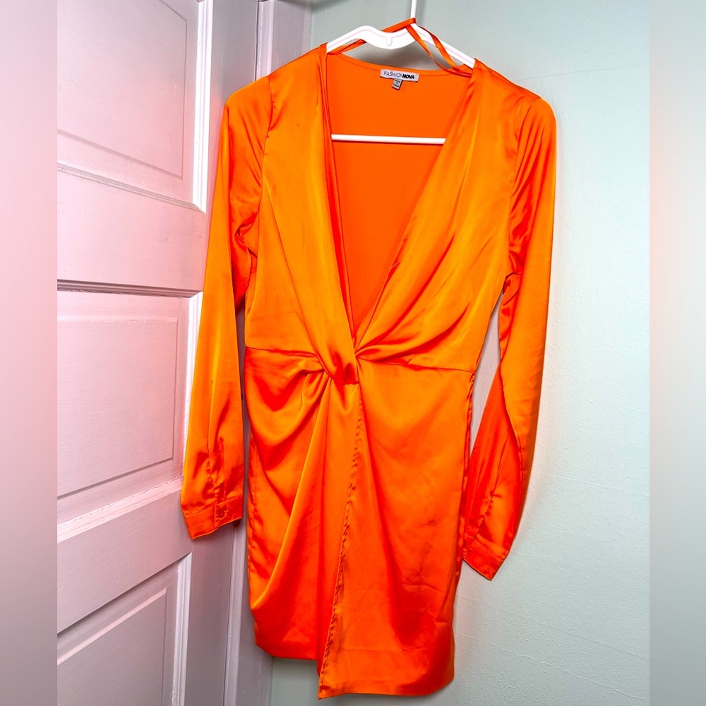Orange silk dress.